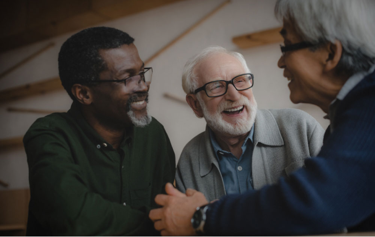 3 men chatting and laughing