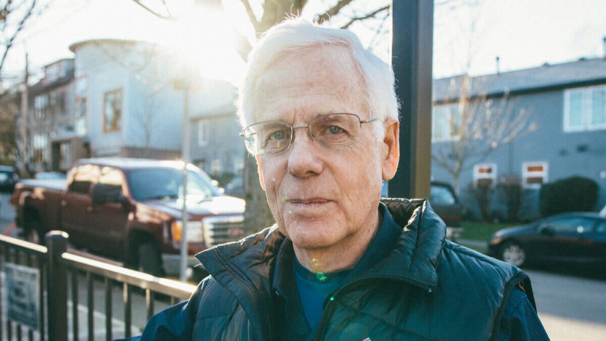 Close up of an older man wearing spectacles 