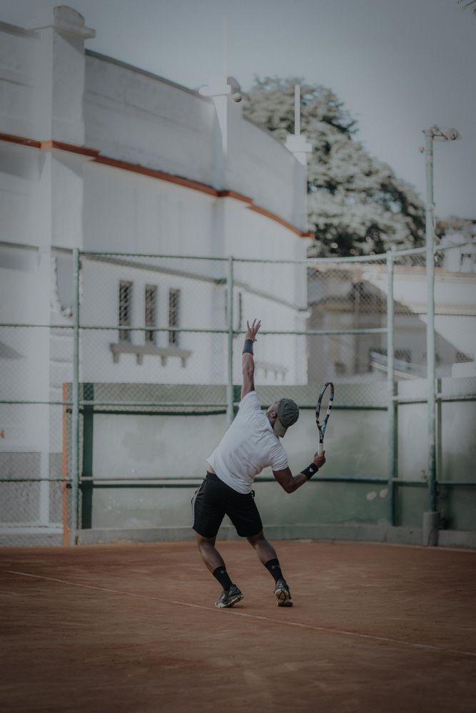 Black man playing tennis