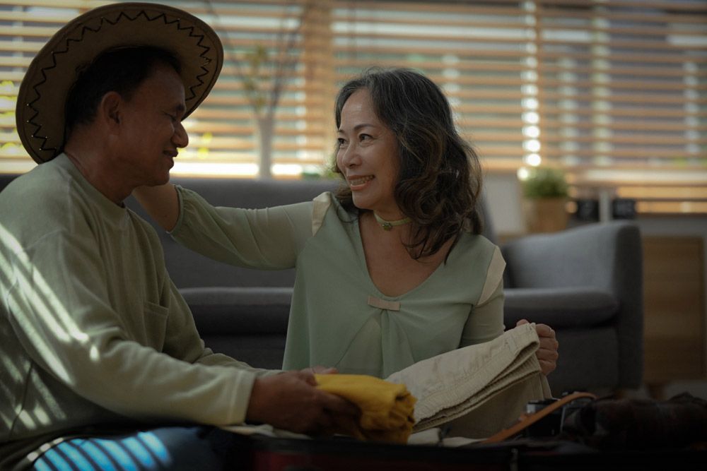 Close up of man and woman smiling at each other