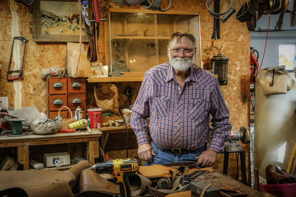 Man standing in his tool shed